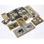 An album of approximately one hundred postcards, early-mid 20th century British views, portraits,