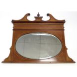 An Edwardian inlaid-mahogany frame overmantel mirror inset bevelled oval mirror plate, 43½” wide x