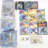 Fifteen various scale model aeroplanes by Matchbox, Maisto, etc. each with original packaging.