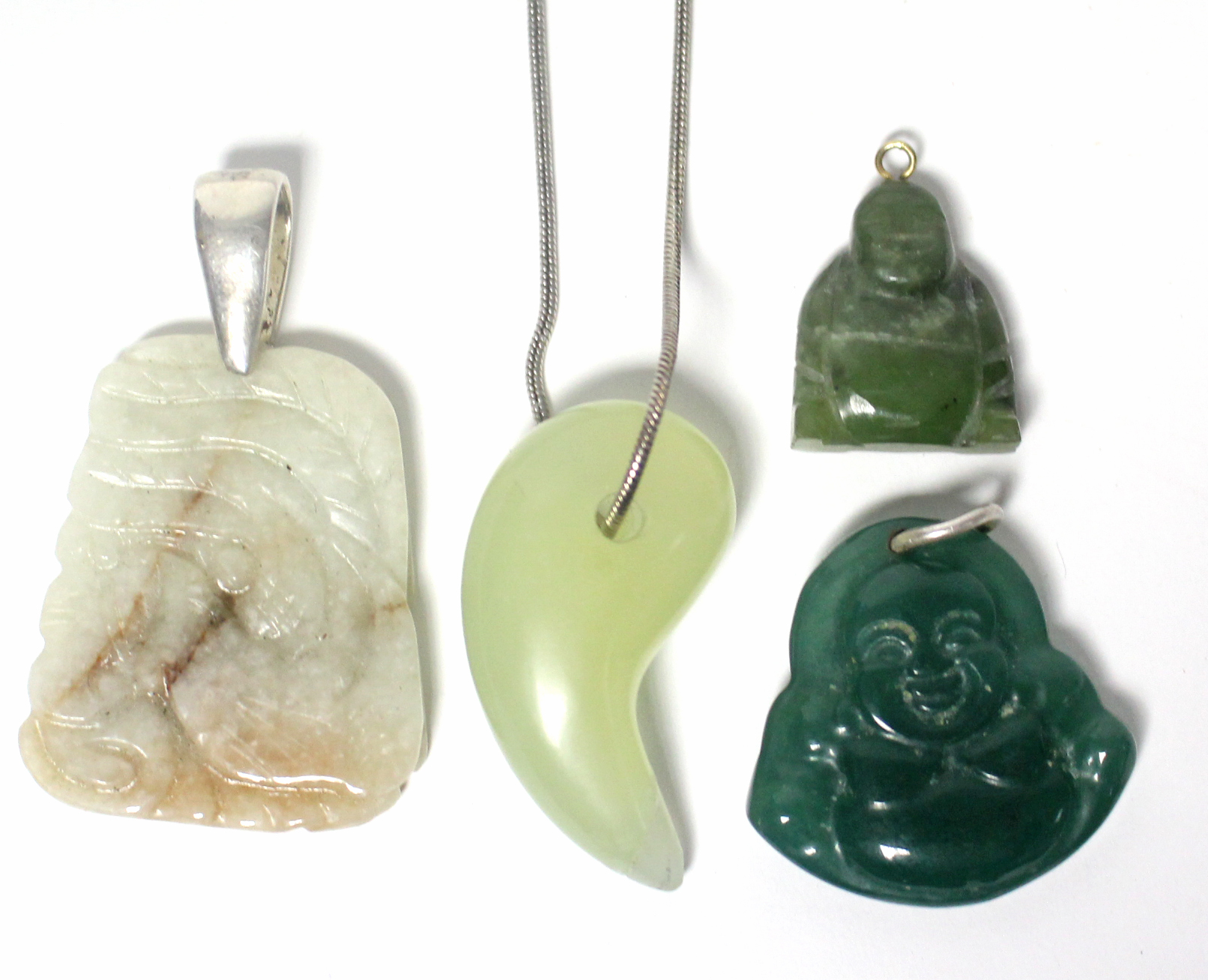 Four modern jade pendants.