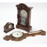 An early 20th century aneroid wall barometer in carved oak banjo-style case, (bezel w.a.f.), 34”