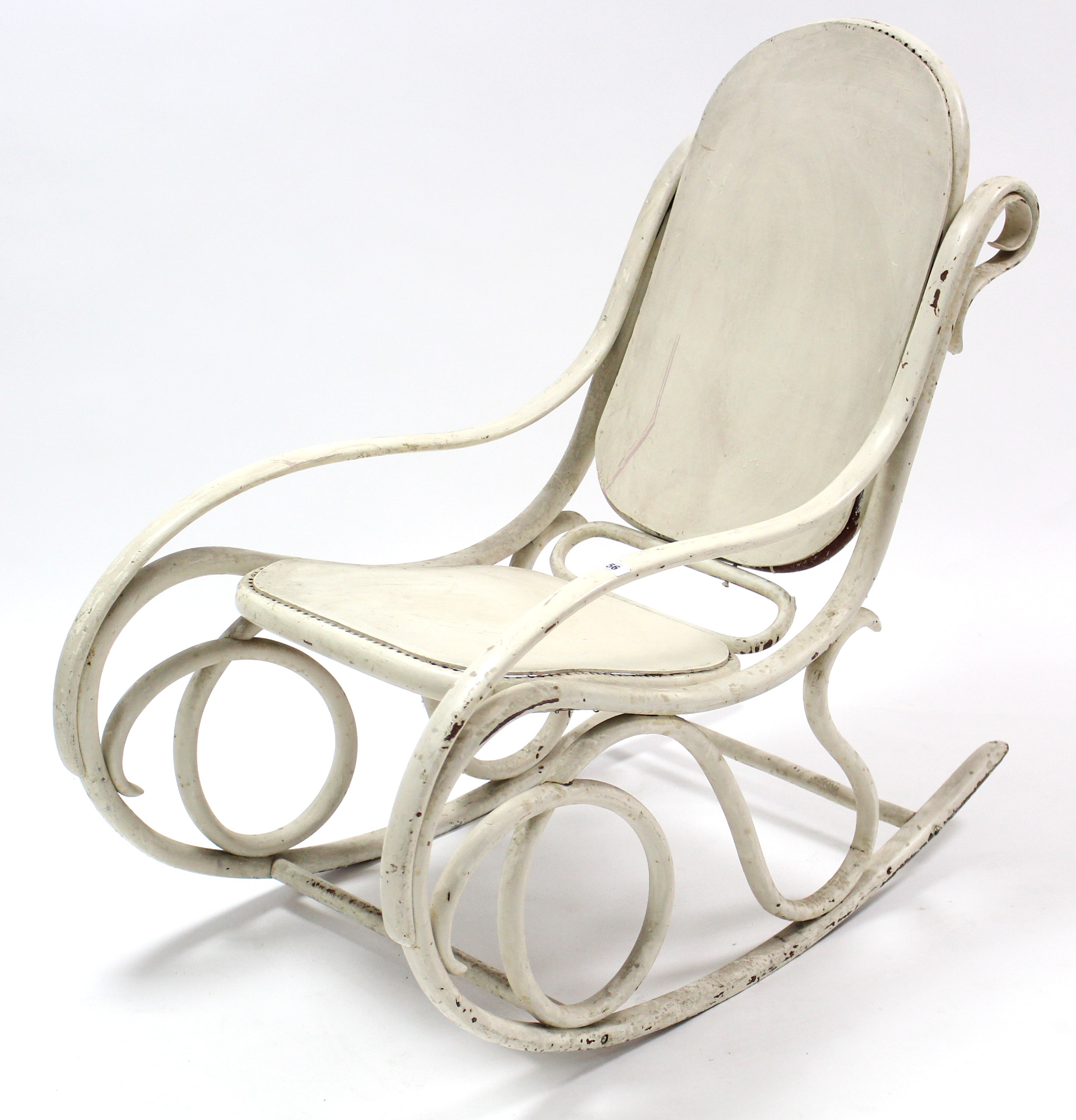 A white painted Bentwood rocking chair; together with three white painted kitchen chairs.