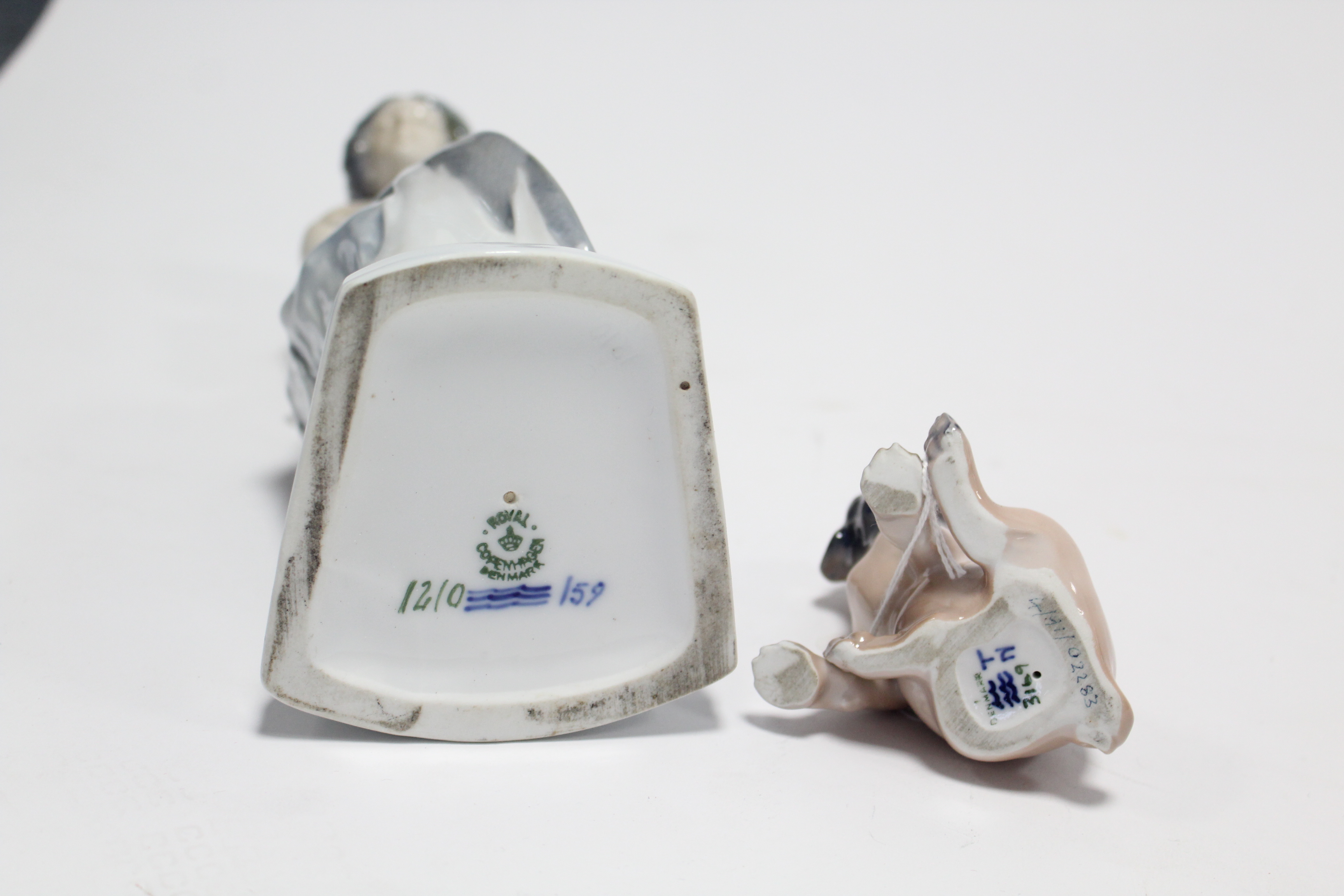 A Royal Copenhagen porcelain ornament in the form of a mermaid seated on an ice rock (No.1210), - Image 4 of 6