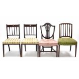 A pair of 19th century mahogany bow-back dining chairs with spring seats, & on square tapered