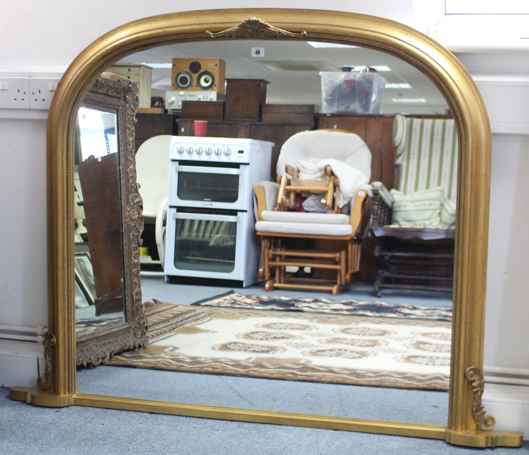 A reproduction gilt frame overmantel mirror, with rounded corners & beaded edge, 41” x 52½”.