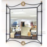 A rectangular wall mirror in black & gold painted wrought-metal frame, 31½” x 33”.