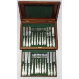 A set of twelve Victorian silver tea-knives & forks with mother-of-pearl handles, Birmingham 1873 by
