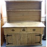 A Victorian-style pine kitchen dresser, the upper part fitted centre shelf & with panelled back, the