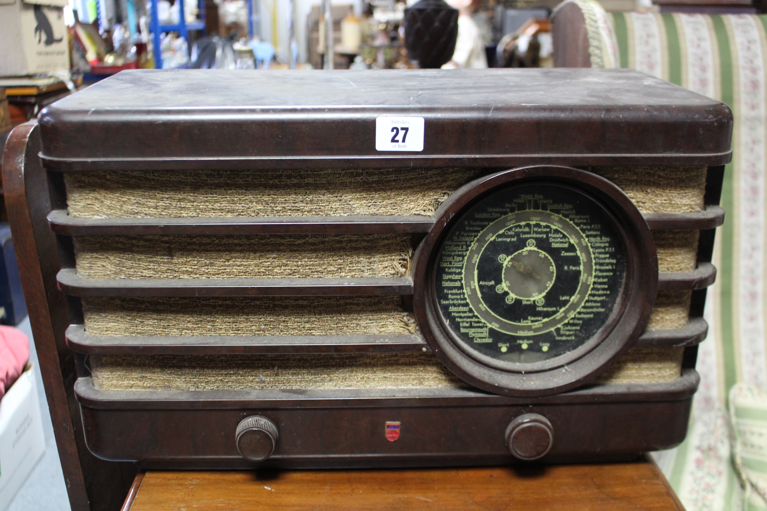 A Philips valve radio in brown Bakelite case; & a Ferguson portable turntable.