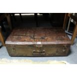 A steel travelling trunk with hinged lift-lid, 25” wide.