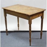 A late Victorian pine side table, with rounded corners to the rectangular top, & on turned tapered