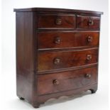 A Victorian mahogany bow-front chest fitted two short & three long graduated drawers with turned