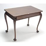 A Chippendale-style mahogany centre table, with rectangular top & on carved slender cabriole