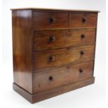 A 19th CENTURY MAHOGANY CHEST, fitted two short & three long drawers with turned knob handles, &