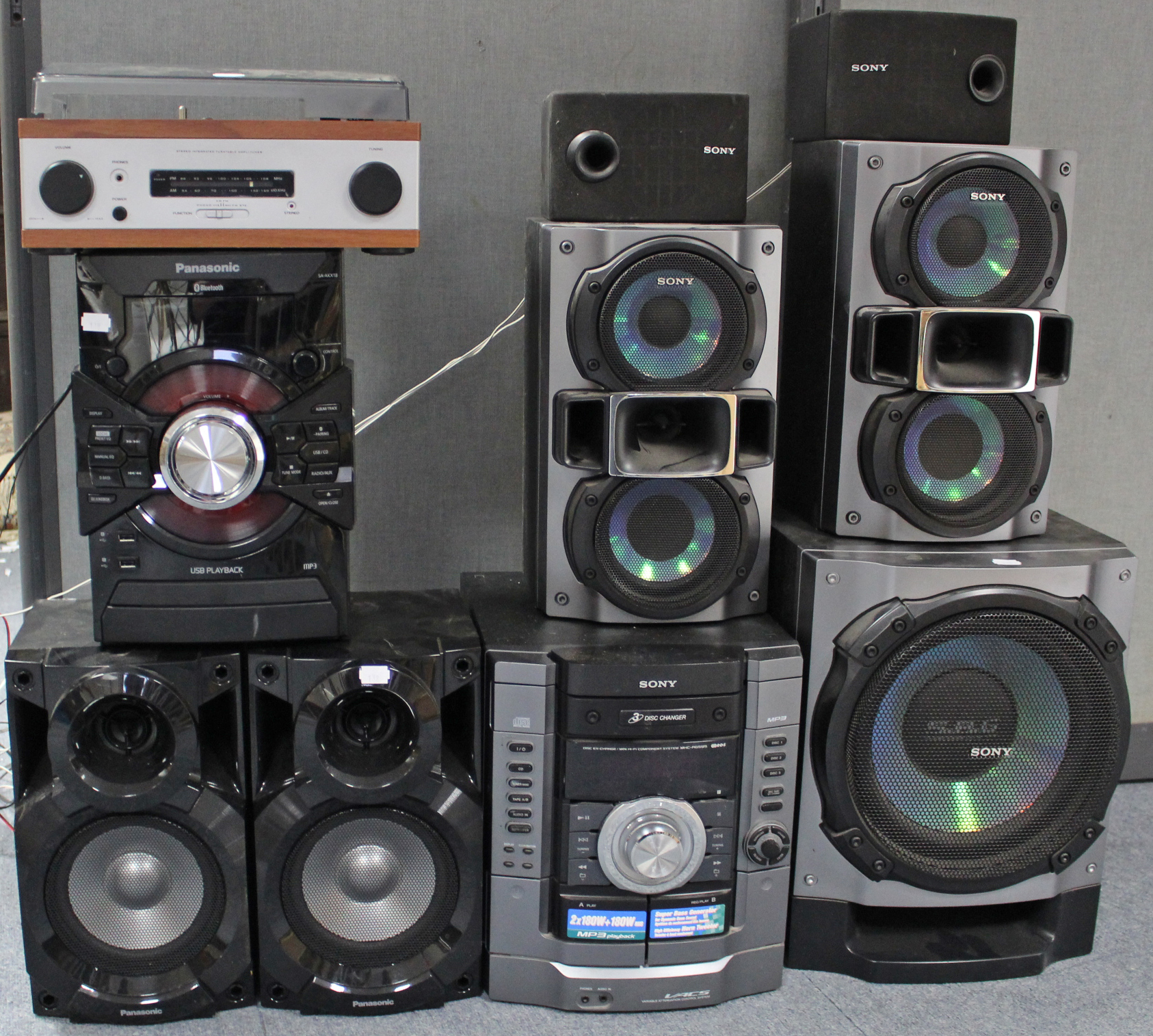 A Sony hi-fi system; a Panasonic CD stereo system; a Derens turntable/radio; & various L. P.