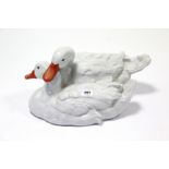 A Herend porcelain white glazed ornament in the form of two ducks, 12½” wide.