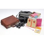 A Konica 40mm camera; a Tamron zoom lens; a camera bag; a briefcase; & various Ordnance Survey &