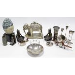 A silver composition elephant model, 16½” high; a Buddha head ornament; & sundry other items.