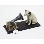 A modern painted cast-iron novelty HMV dog & gramophone ornament, 8½” wide.