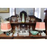 Two art glass vases; four cut-glass table lamps; five glass decanters; & various other items of