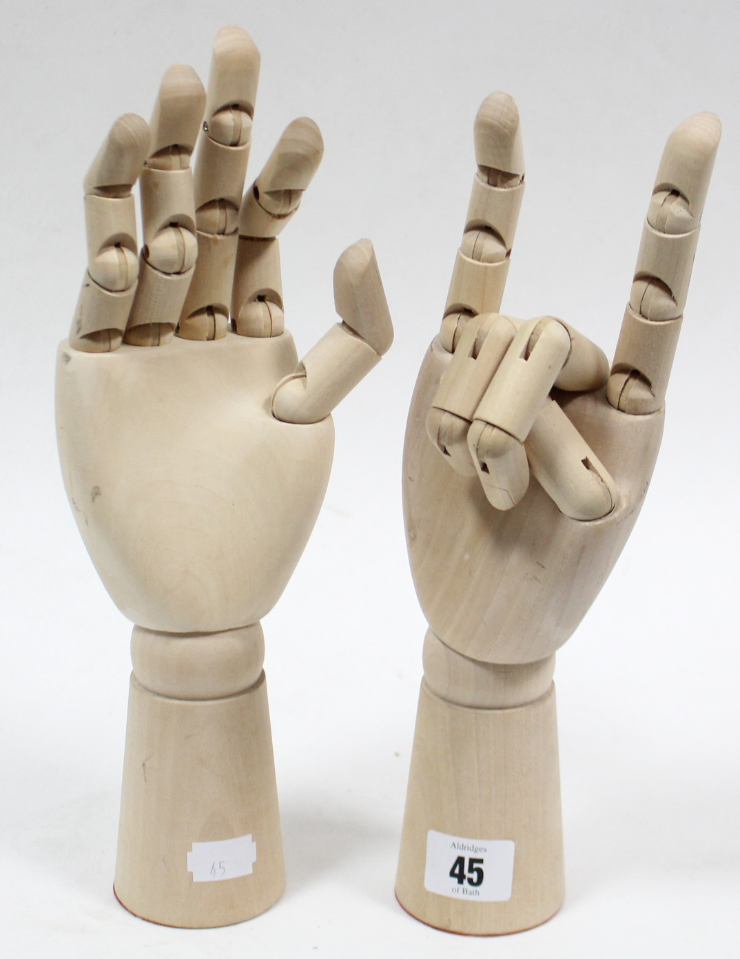 A modern pair of treen artist’s lay hand models, 12” long.