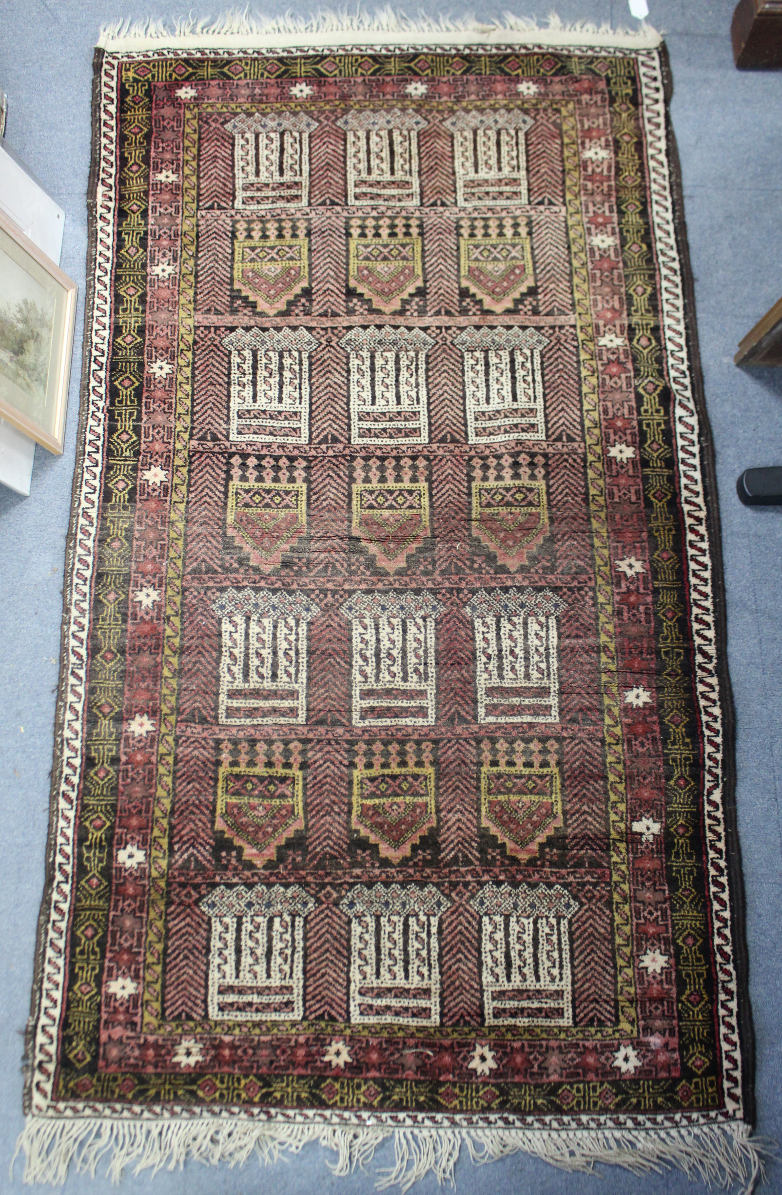 Three Persian pattern rugs (various sizes).