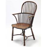 An early/mid-19th century YEW, ASH, & ELM WINDSOR ELBOW CHAIR, with hooped stick back, shaped