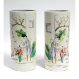 A pair of 20th century Chinese porcelain cylindrical vases, each painted with a mother & child in