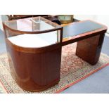 A modern mahogany-finish pedestal desk/display cabinet with D-shaped ends & inset leatherette top,