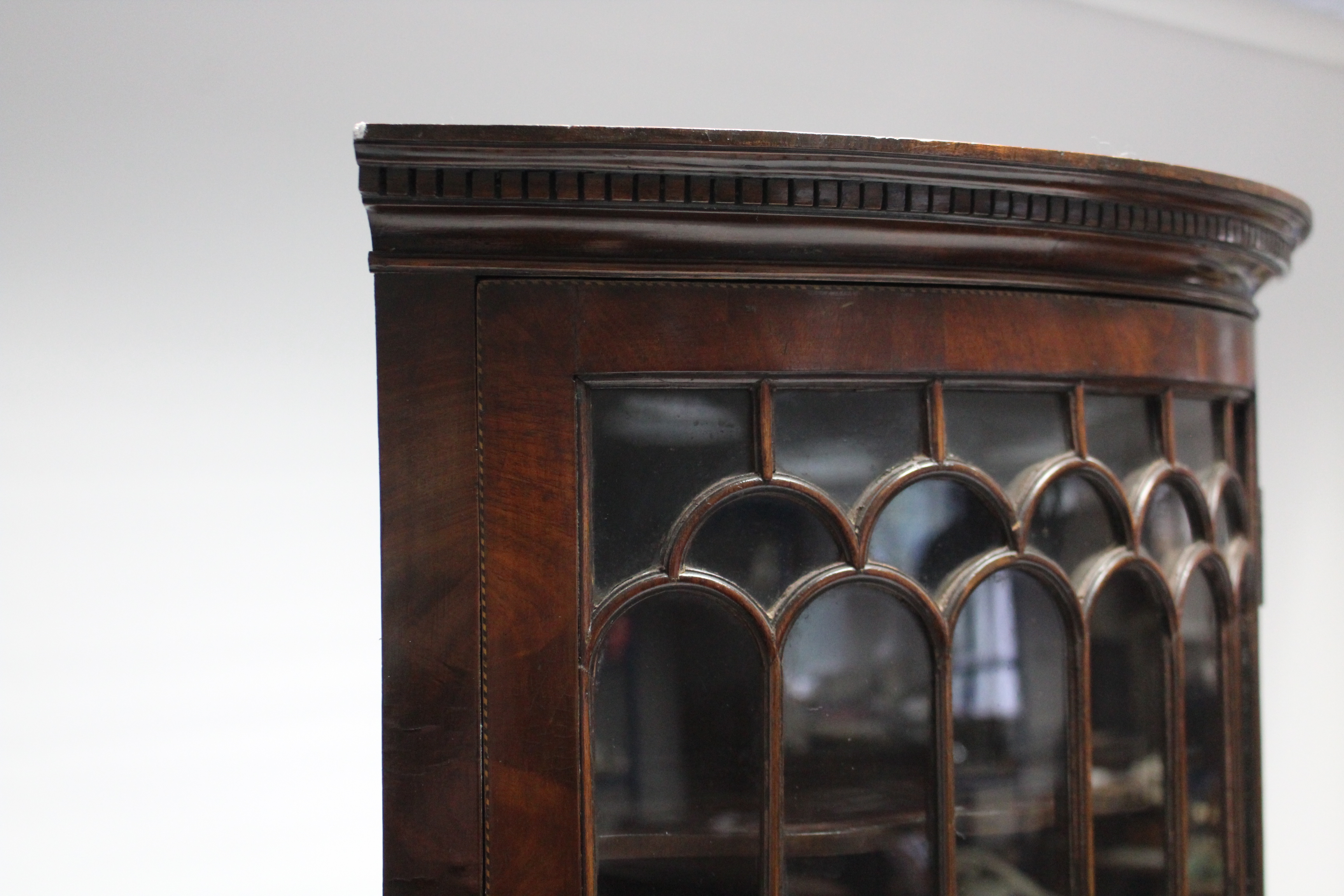 An early 19th century inlaid-mahogany bow front standing corner cabinet, the upper part with moulded - Image 4 of 4