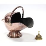 A 19th century brass coal scuttle with swing handle, 13” high; together with a modern brass