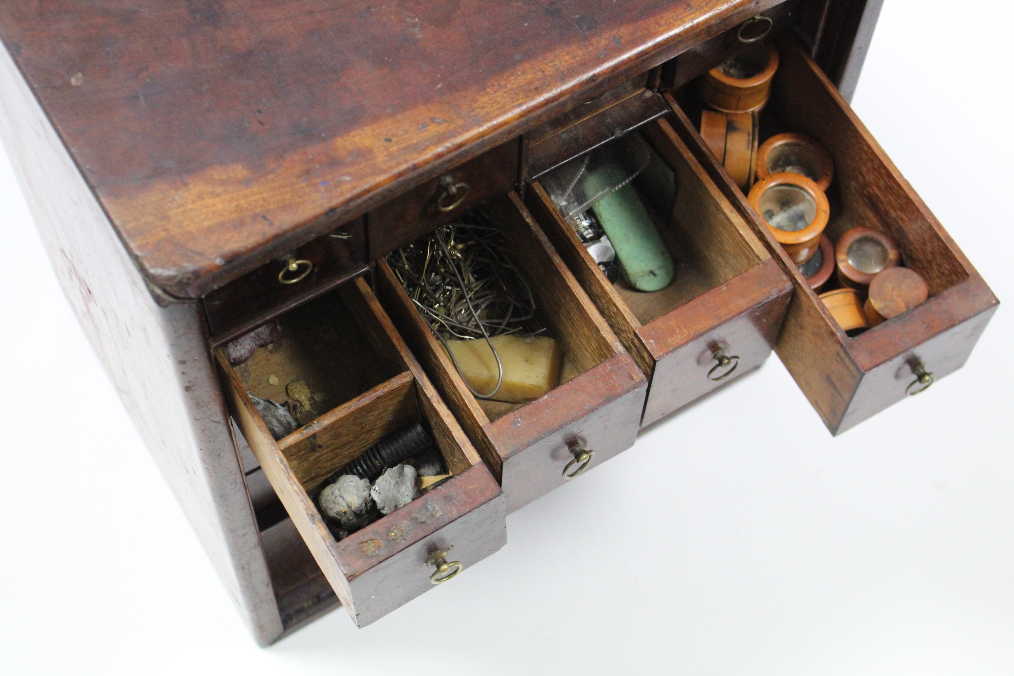 An 18th century mahogany spice cabinet fitted an arrangement of sixteen small drawers with brass - Image 4 of 5