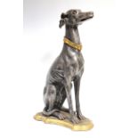 A painted composition model of a seated greyhound, on shaped plinth base; 30¼” high.