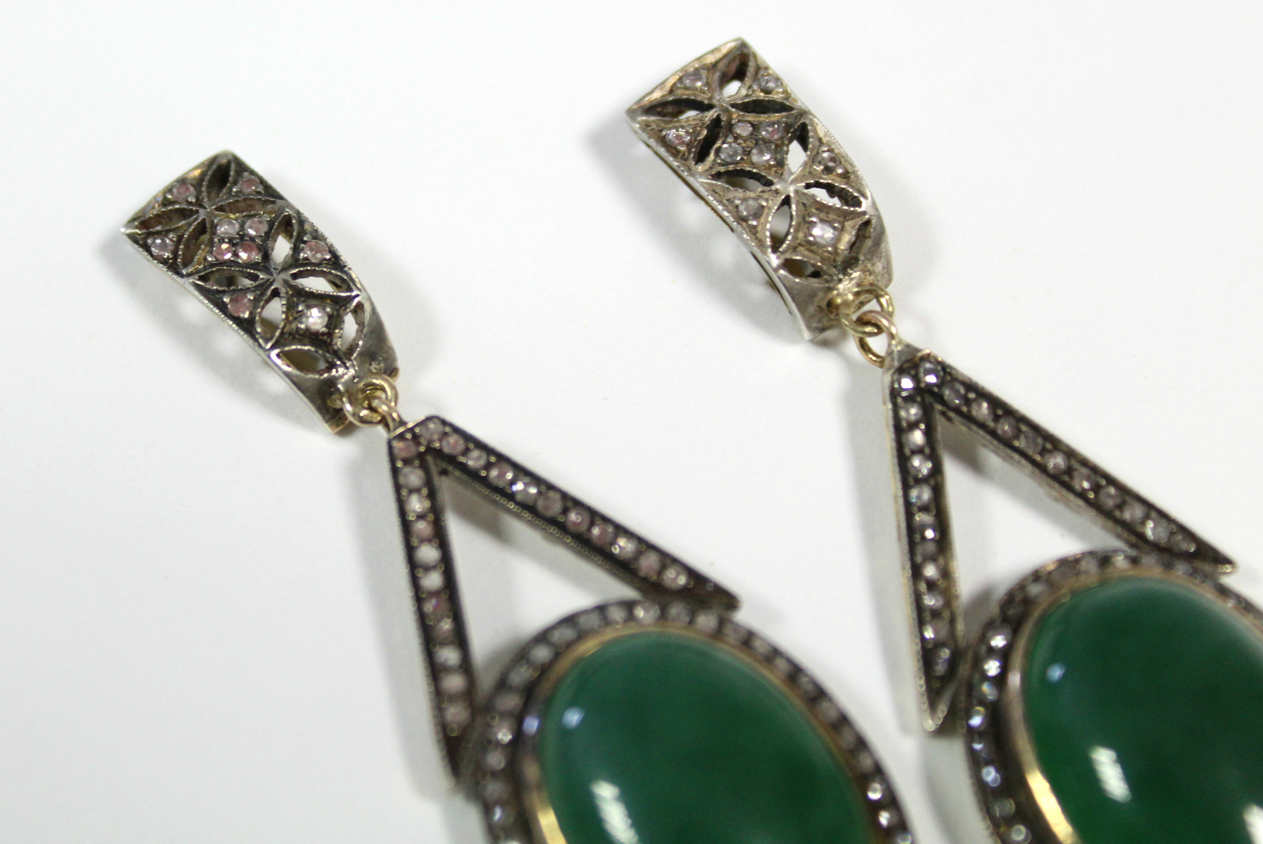 A PAIR OF JADE & DIAMOND PENDANT EARRINGS, each with oval green jade cabochon suspended from an - Image 3 of 4