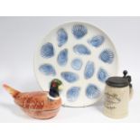 A 1960’s Elchinger pottery dish with design of oyster, mussel, & clam shells in blue on an off-white