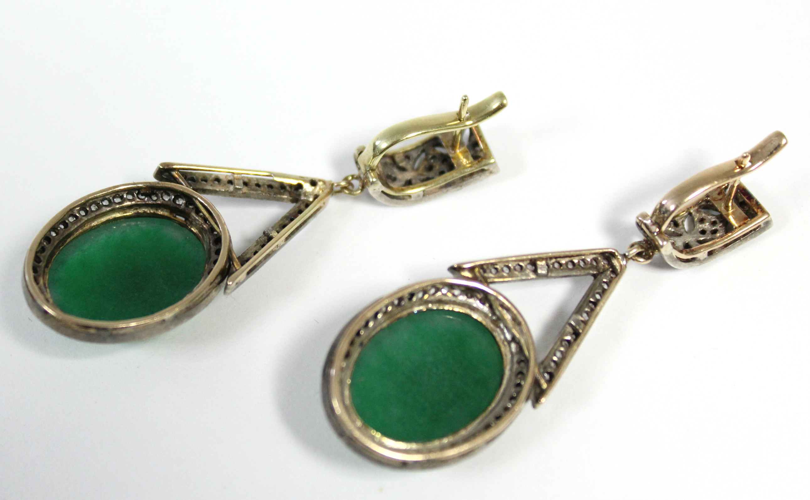 A PAIR OF JADE & DIAMOND PENDANT EARRINGS, each with oval green jade cabochon suspended from an - Image 4 of 4