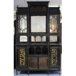 A VICTORIAN AESTHETIC-MOVEMENT EBONISED & GILT DECORATED CABINET, the upper part with moulded