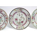 Three early 18th century Chinese porcelain plates, variously painted with birds, a butterfly,