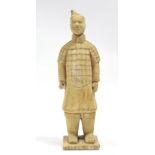 A plaster replica of a Qin dynasty terracotta soldier tomb figure; 29” high.