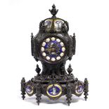 A 19th century French mantel clock in bronzed medieval style case, the blue-ground porcelain 3½”