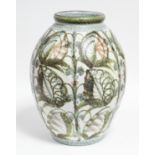 A studio pottery stoneware ovoid vase by Glyn Colledge with painted stylised floral decoration;