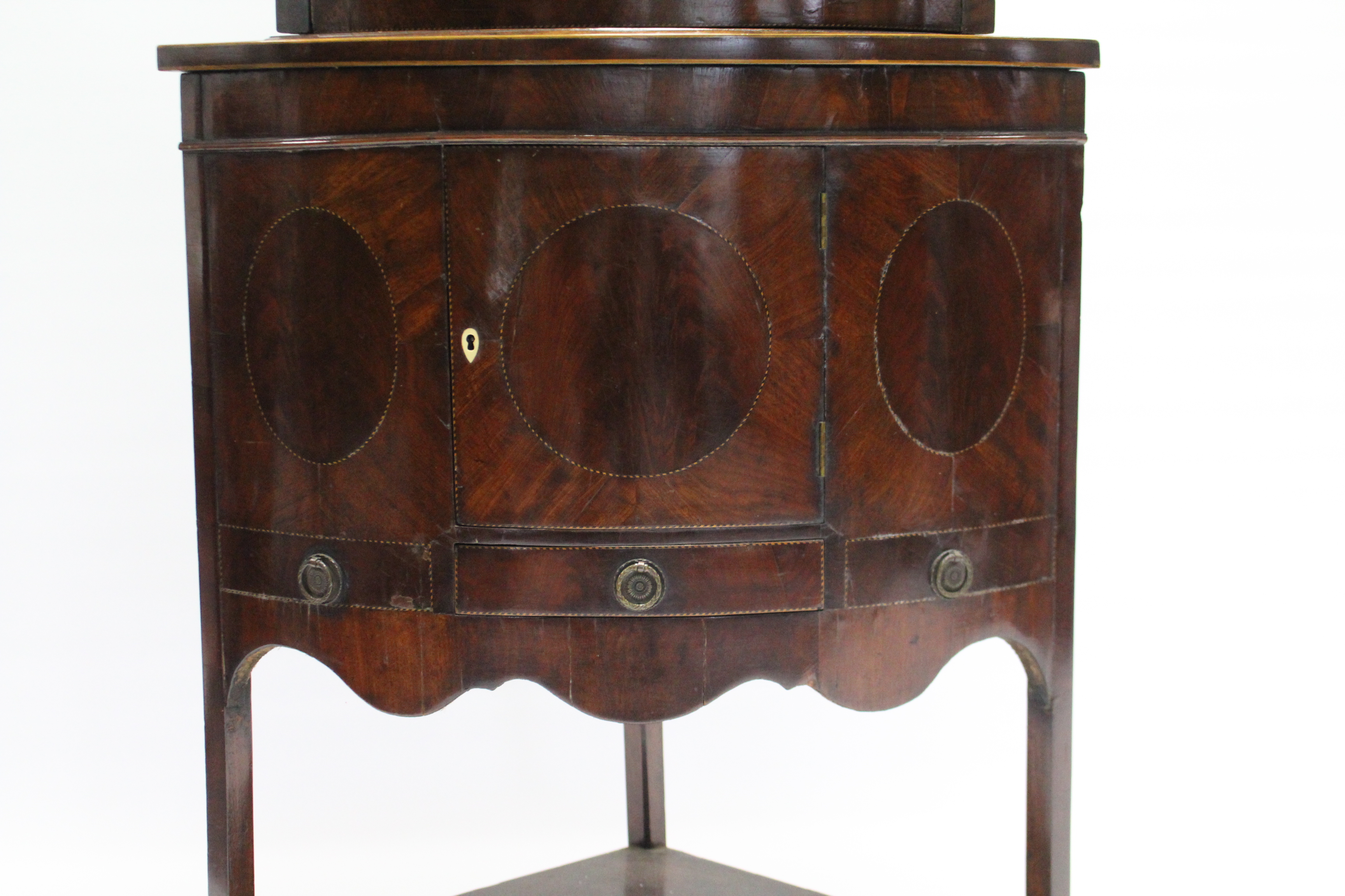 An early 19th century inlaid-mahogany bow front standing corner cabinet, the upper part with moulded - Image 2 of 4