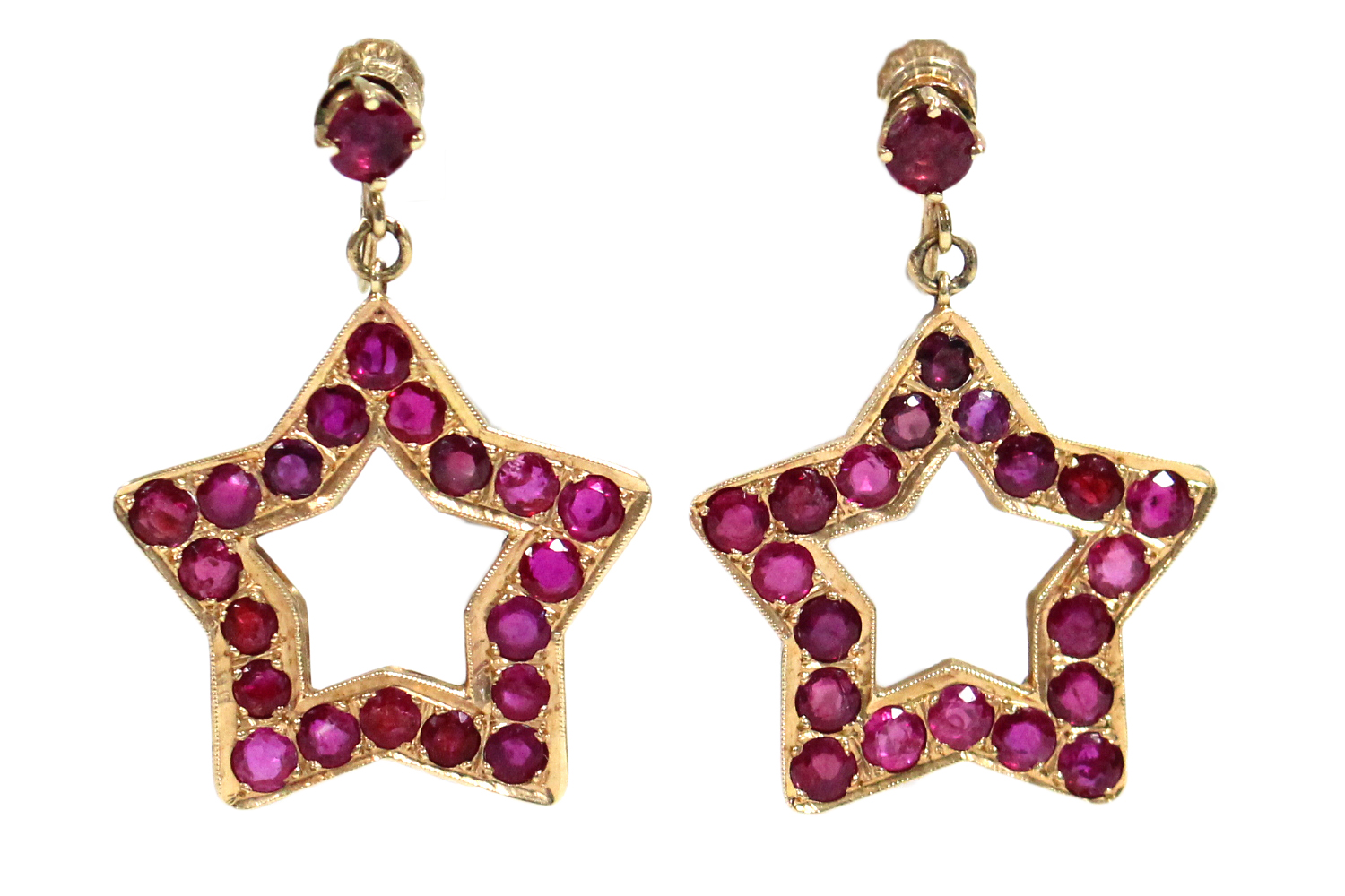 A PAIR OF RUBY PENDANT EARRINGS, each of open five-pointed star shape, set twenty round-cut stones