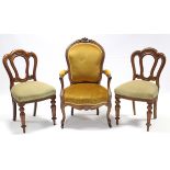 A mid-Victorian carved rosewood frame fauteuil, with shaped back, open scroll arms, & upholstered