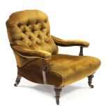 A mid-Victorian mahogany frame open armchair, the buttoned-back, padded seat & arms upholstered