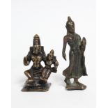 A 19th century Indian bronze figure group depicting Shiva & Parvati, 2¼” high, in metal reliquary