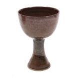 A Chinese brown-glazed stoneware stem cup; 4” diam. x 5½” high.