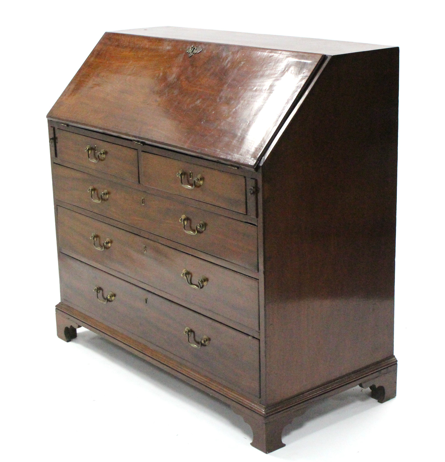 A George III inlaid mahogany bureau, the sloping fall-front enclosing a fitted interior, with