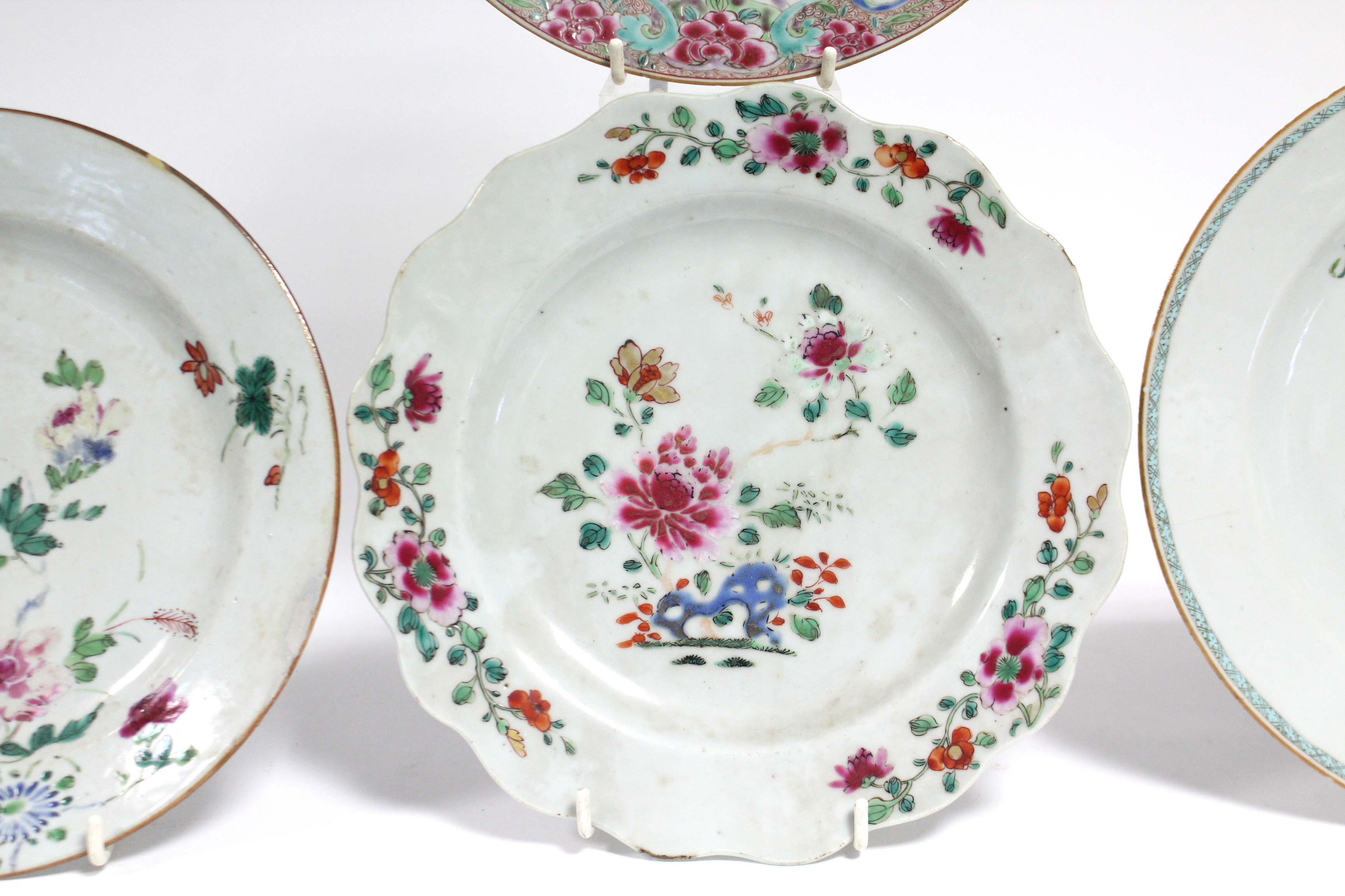 Four 18th century Chinese porcelain plates, variously painted with exotic flowers in famille rose - Image 3 of 6