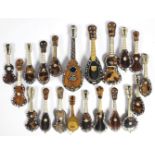 A collection of twelve Italian tortoiseshell veneered miniature models of mandolins; seven ditto